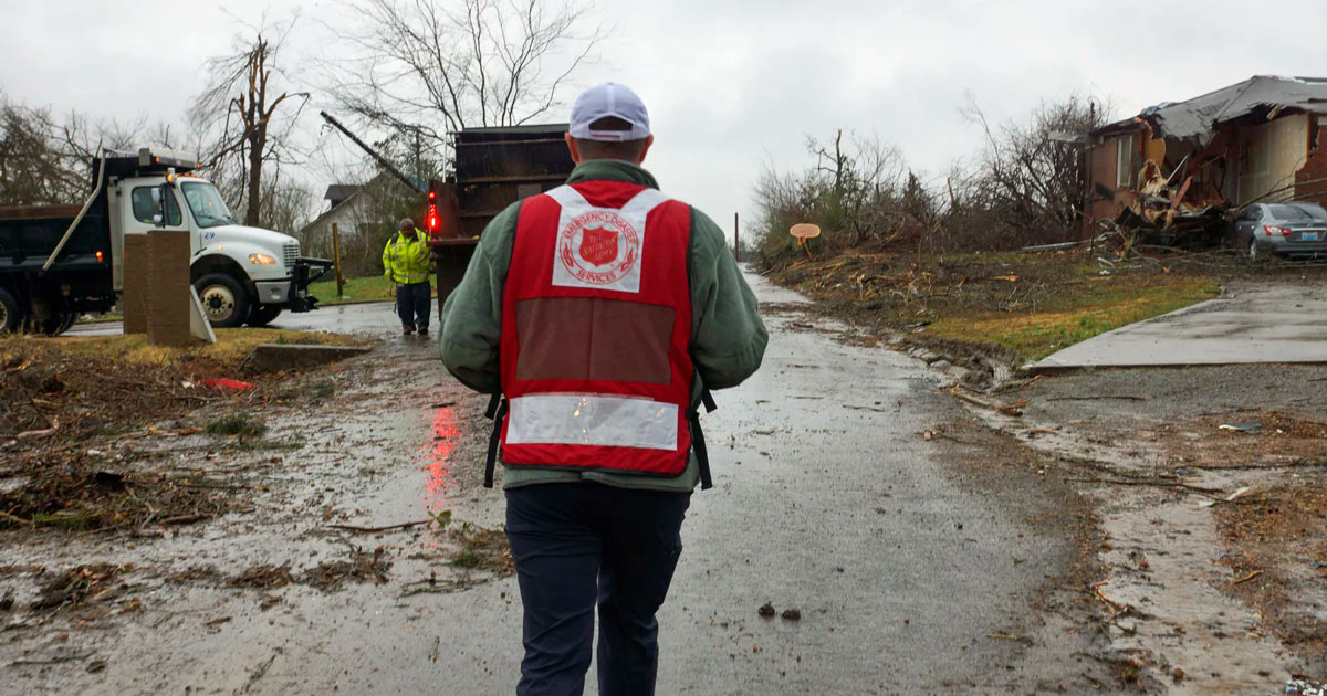 A Salvation Army EDS worker surveys tornado damage in Kentucky