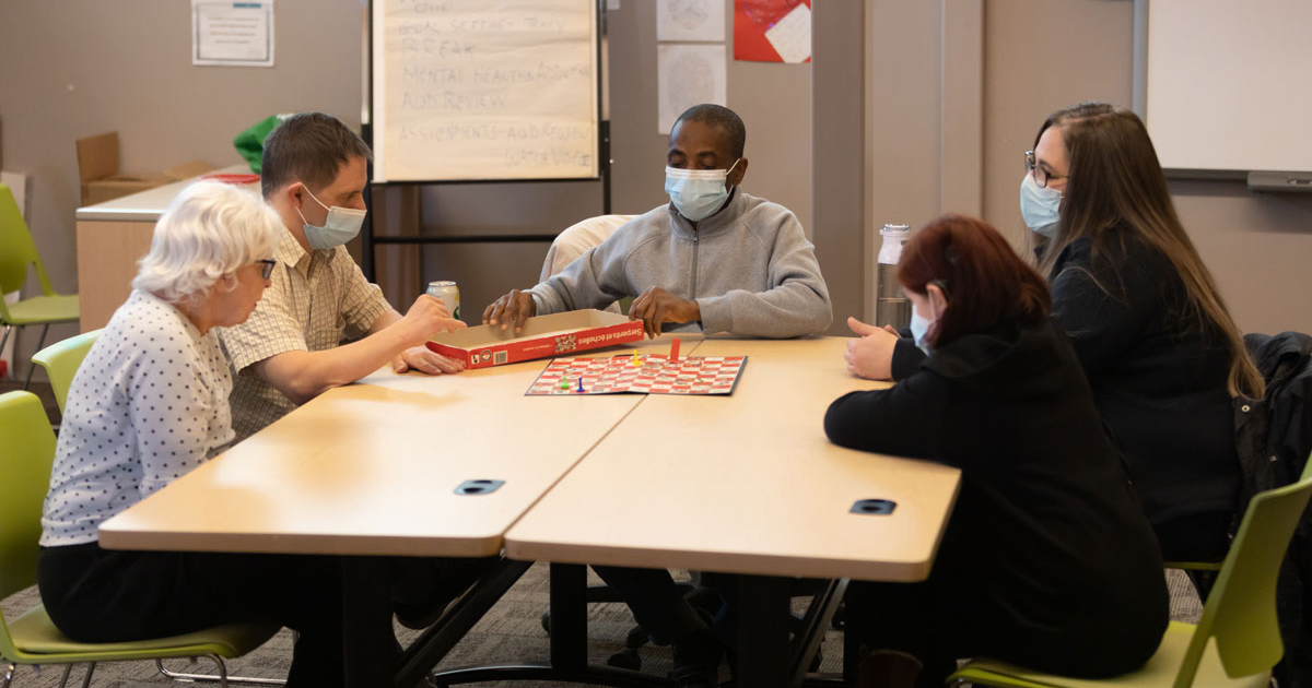 Playing board games at Community Venture