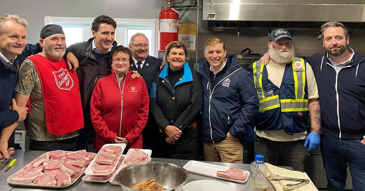 Prime Minister Justin Trudeau joins EDS personnel as they prepare meals in Channel Port-aux-Basques