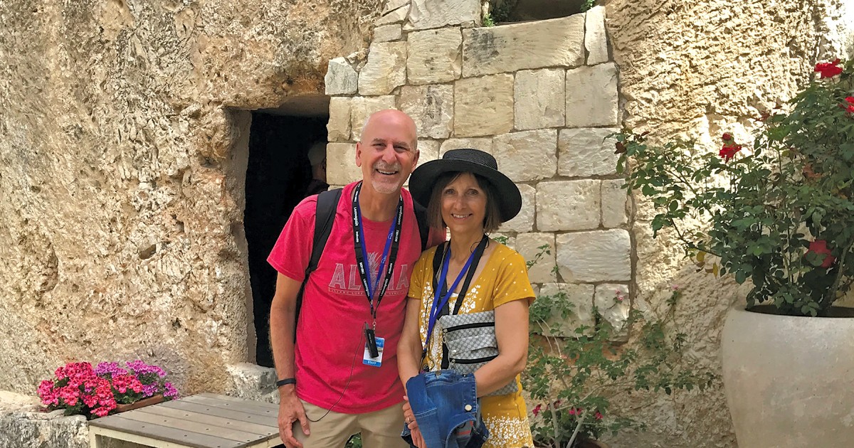 Phil and Ramona Callaway in Jerusalem at the rock cut tomb adjacent to a rocky knoll known as Skull Hill. The tomb was unearthed in 1867 and draws hundreds of thousands of visitors each year
