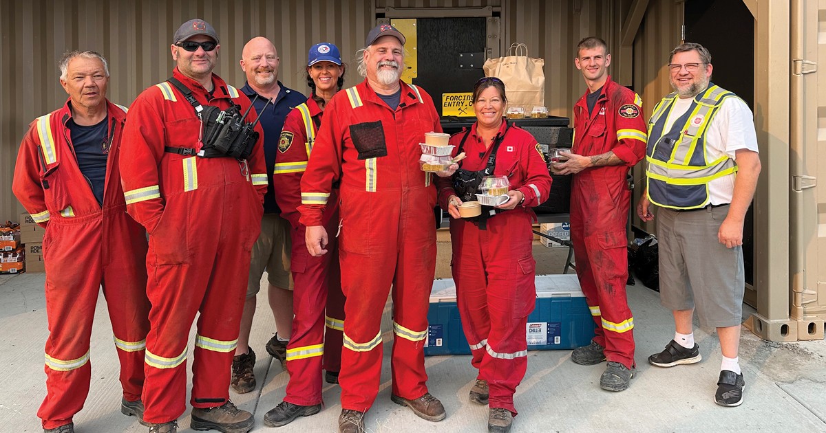 A Salvation Army EDS team delivers food to a firehall